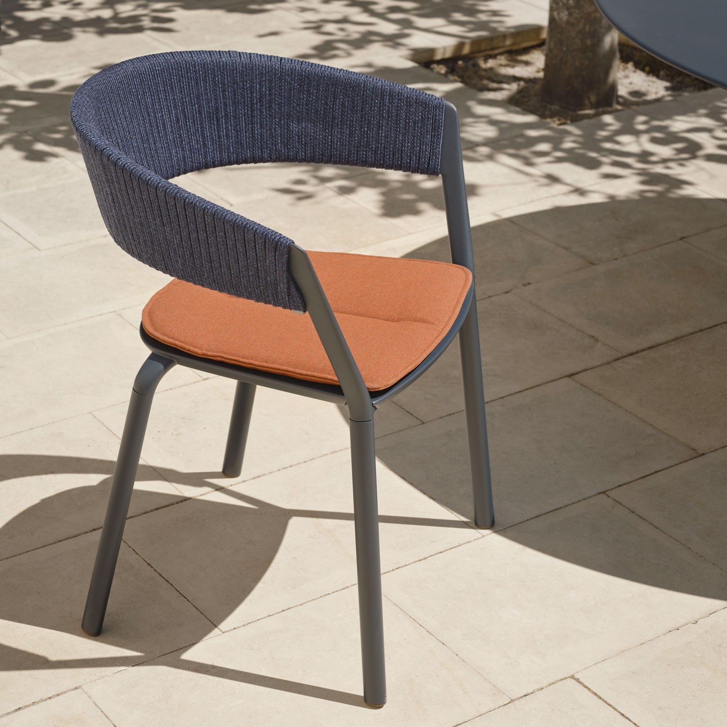 Ria dining armchair partially woven rope